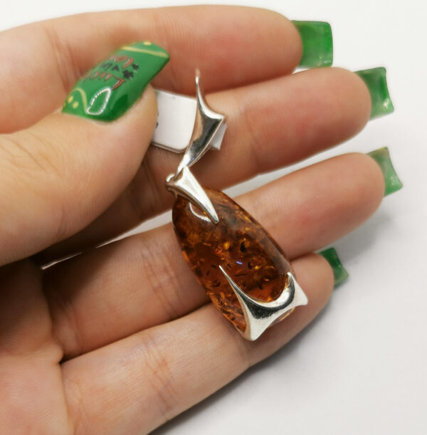 Liquid silver amber pendant 2